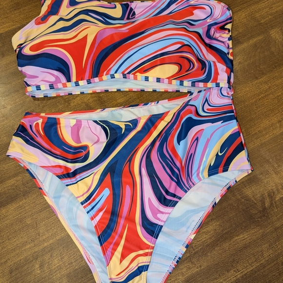 Vibrant Red and Blue One Piece with Artistic Swirls - Picture 1 of 7